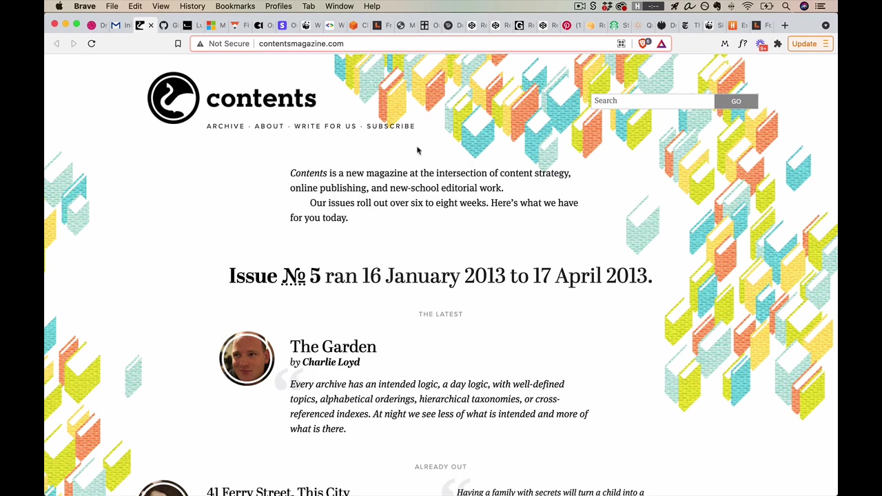 Contents Magazine at full width — colorful books scattered naturally across the header, purpose-composed for a wide canvas